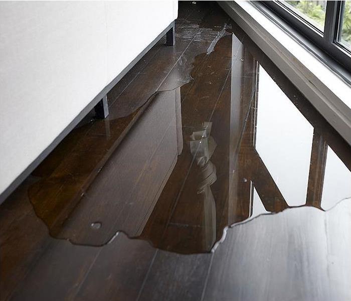 water damaged flooring from leak