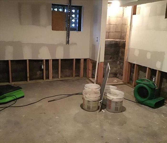basement with flood cuts, removed sheetrock on walls