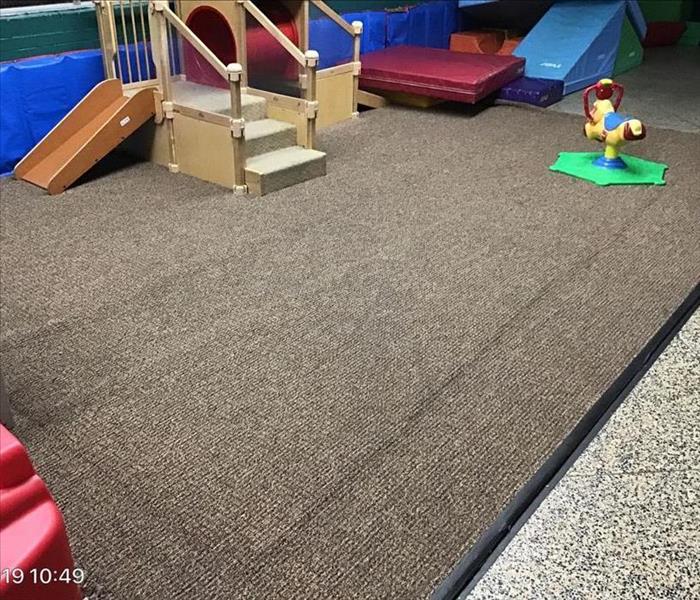 wet carpet in a daycare center